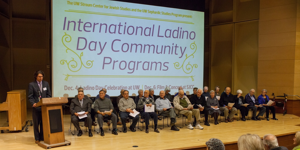 Prof. Devin Naar and Los Ladineros take the stage in Kane Hall at International Ladino Day 2014. Photo by Meryl Schenker Photography.