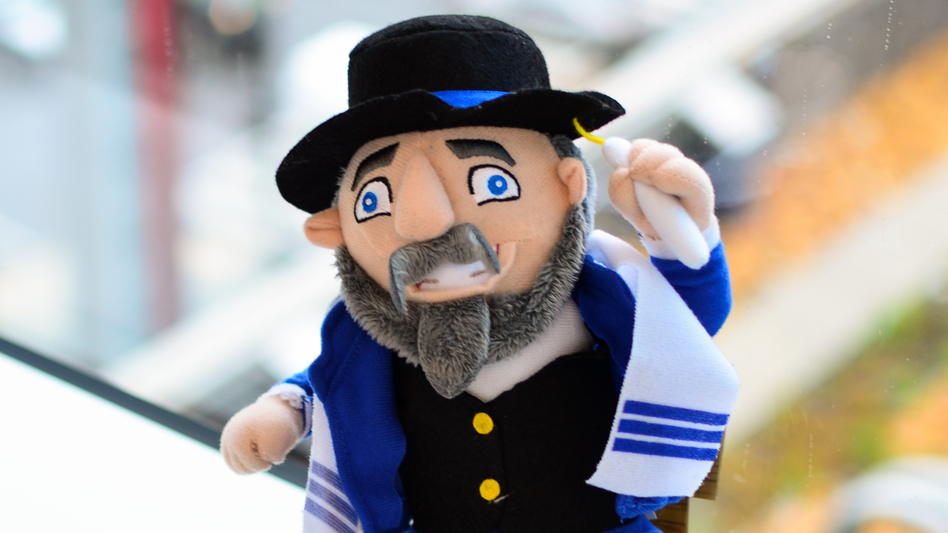 This year's Hanukkah toy sensation, the Mensch on a Bench, brings shtetl nostalgia into the Hanukkah story.