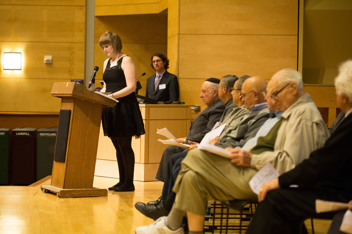 PhD student Molly FitzMorris takes the stage with Prof. Devin Naar and the Seattle Ladineros at Ladino Day 2014. Photo by Meryl Schenker Photography.