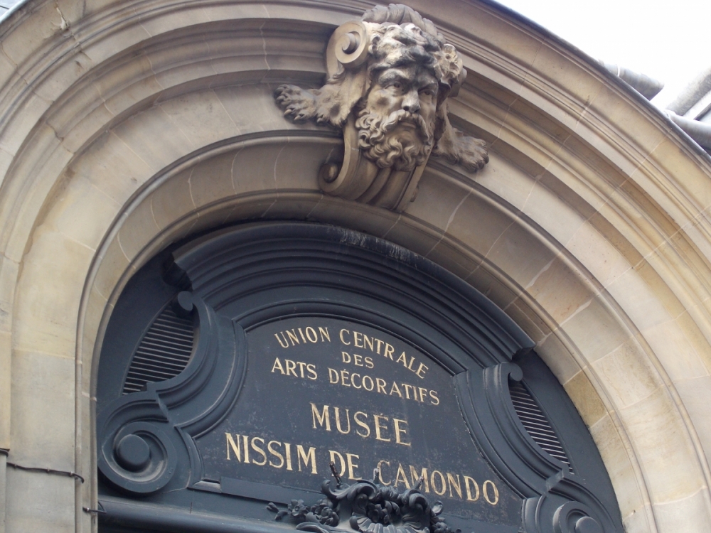 An archway with an architectural flourish reveals the name of the museum, named in memory of Moise De Camondo's father as well as his son.