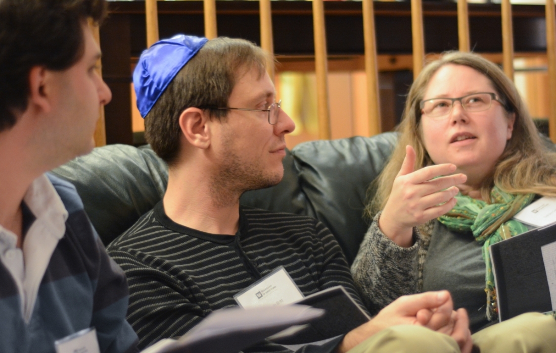 Kevin Britt and Deirdre Gabbay debate a point during a 2015 Community Learning Fellowship session.
