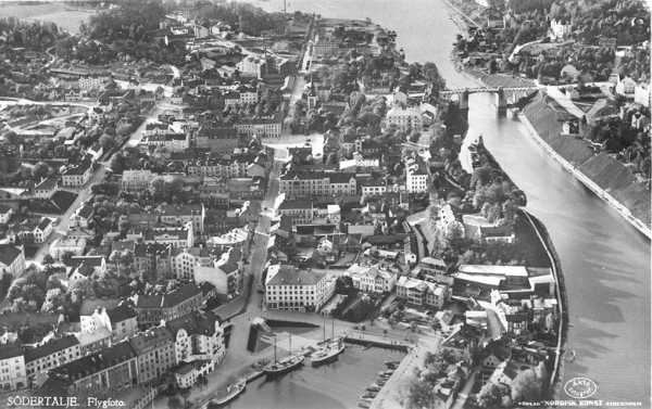 Aerial view of central Södertälje, ca. the 1960s. Södertälje lies southwest of Stockholm. The city's canal connects Lake Mälaren to the Baltic Sea. 