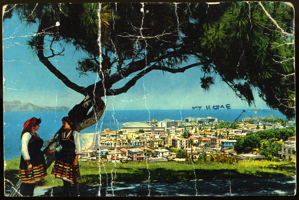 Postcard from Victor Capeluto to his sister Rachel Shemarya with an arrow pointing to their former home on the Island of Rhodes