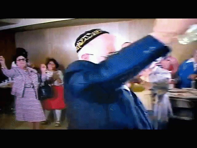 Rabbi Maimon dancing to La Vida Do Por El Raki with community members at Sephardic Bikur Holim.