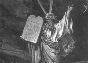 Engraving of Moses bringing the tablets of law to the people