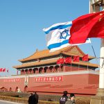 The Israeli flag flies next to China's in a key flagpole near Tiananmen Square in Beijing