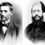 A pair of black-and-white portraits of Ben Yehuda, wearing a tie, overcoat and glasses, and Hataria wearing a fez in a traditional overcoat