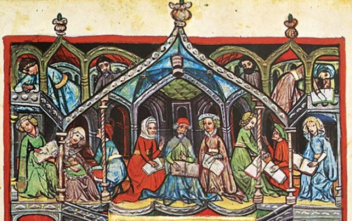Medieval illumination from the Darmstadt Haggadah showing a group of men and women in long medieval robes studying books