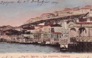 Colorized postcard showing raised houses on hillside, built directly above the water. The postcard is dated 1906 in handwriting and reads "Smyrna — Les Altenours, Caratach"