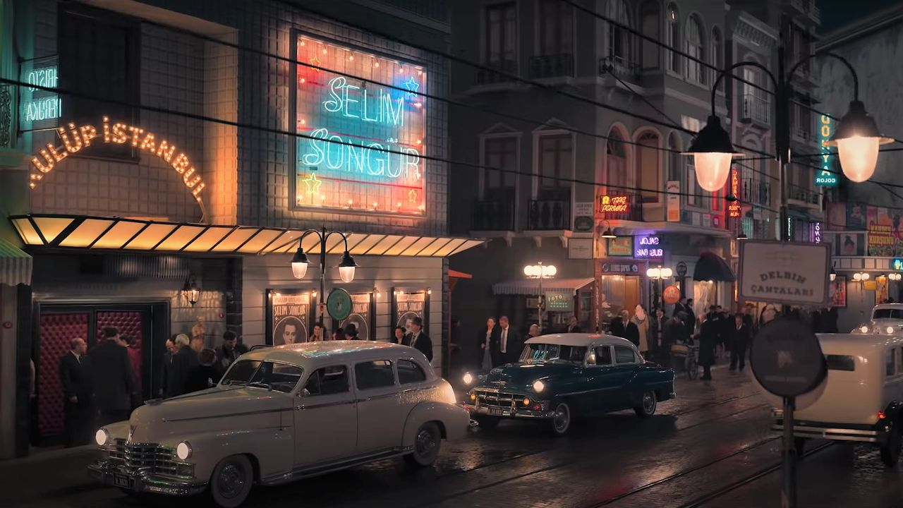 Street in Istanbul at night with lights. Kulüp Istanbul (Club Istanbul) pictured at left. White 1950s era car parked on the street in the foreground.