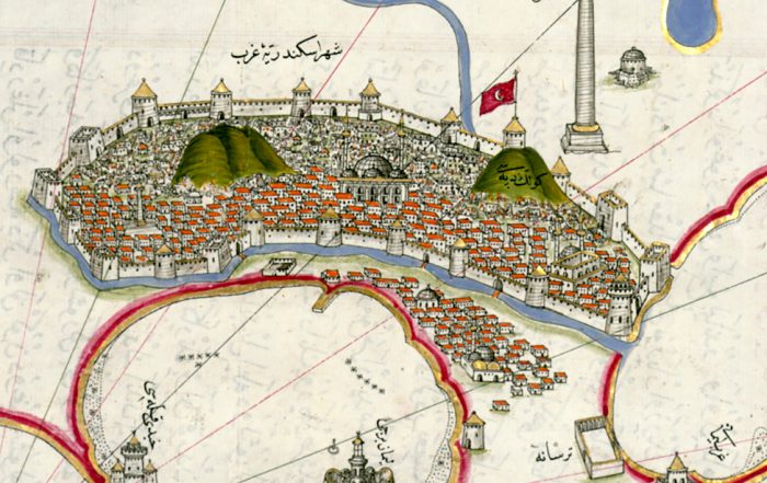 Map showing the walled port city of Alexandria in medieval times, with the famous lighthouse at top right (west) and names written in Arabic lettering