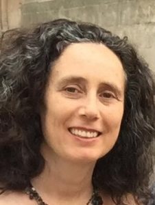 portrait of Dalia Kandiyoti smiling