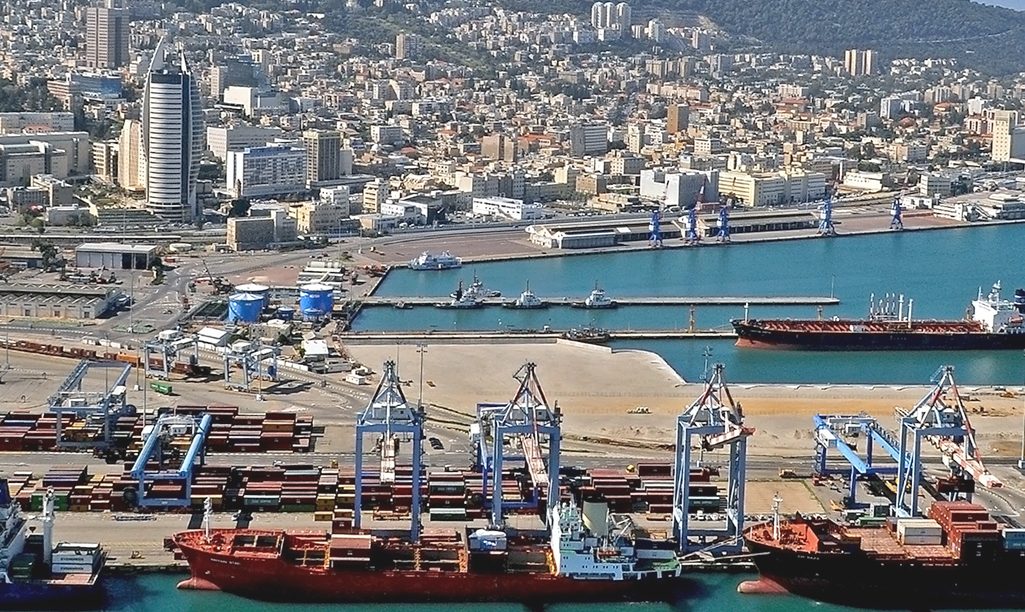 Photo showing port of Haifa with cranes and cargo ships