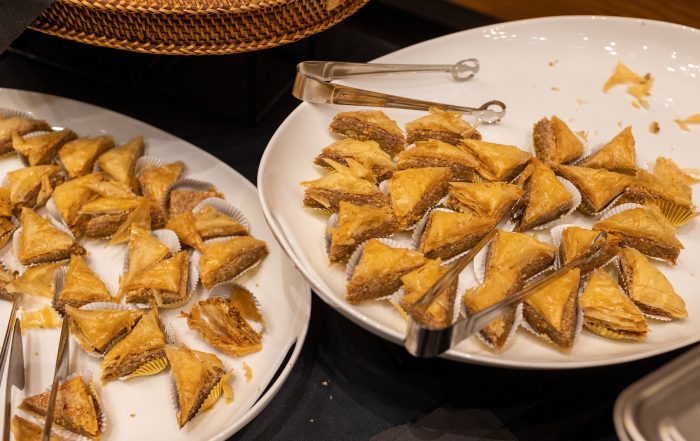 2 large platters of baklava and tongs for serving