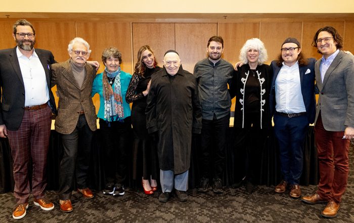 Sephardic artists gather for a photo with Hazzan Isaac Azose, Professor Devin Naar, and Divisional Dean of the UW's School of Arts, Gabriel Solis.