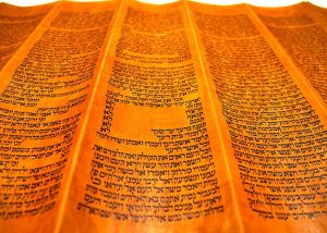 Closeup image of an open Torah scroll
