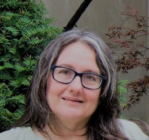 Headshot of Naomi Seidman with glasses