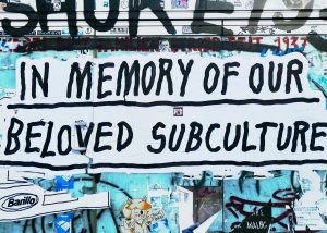 Graffiti on tall wall: "In Memory of Our Beloved Subculture." Photo by Bekky Bekks