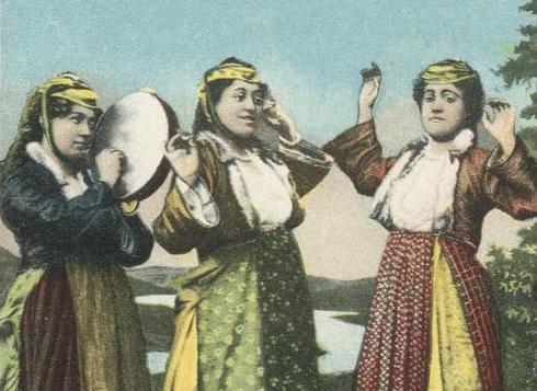 Women in traditional 19th-century clothing dancing, one holding a tamborine