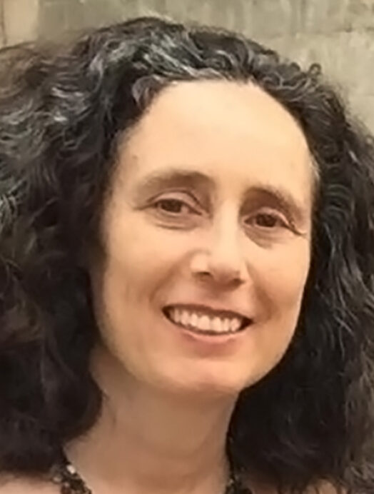 Dalia Kandiyoti, smiling outdoors