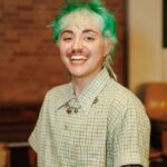 Headshot of person in button down shirt