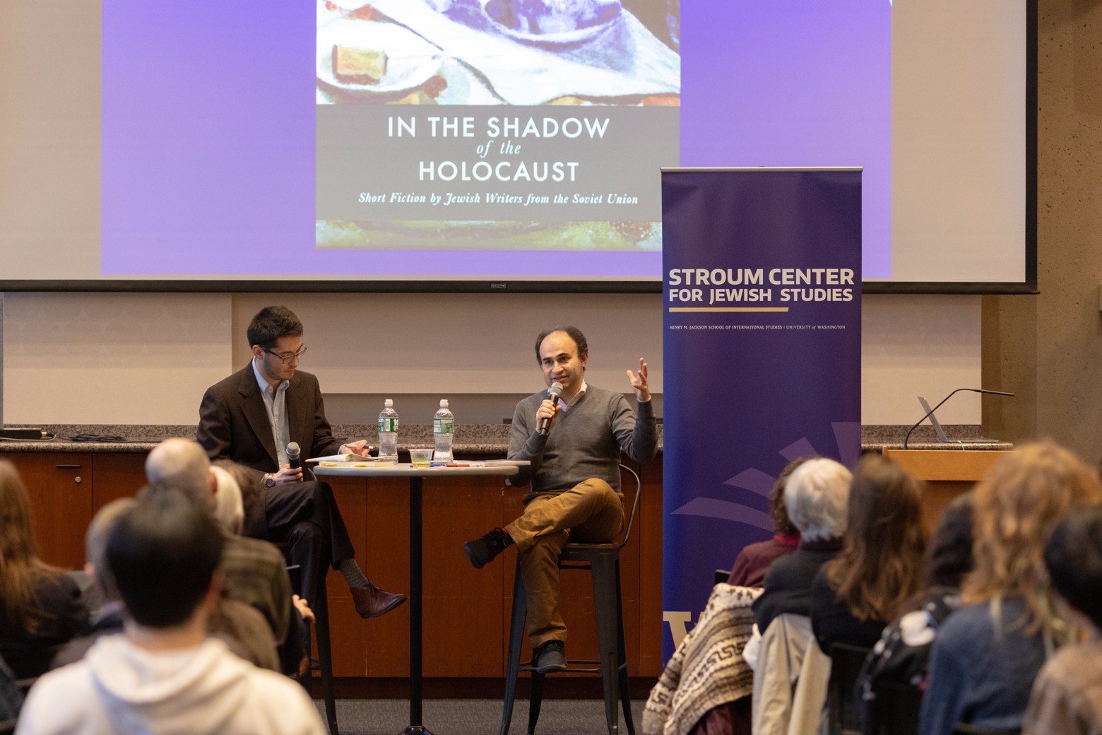 An audience listens as two speakers discuss a book at a Stroum Center for Jewish Studies event.