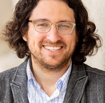 a headshot of director Devin Naar