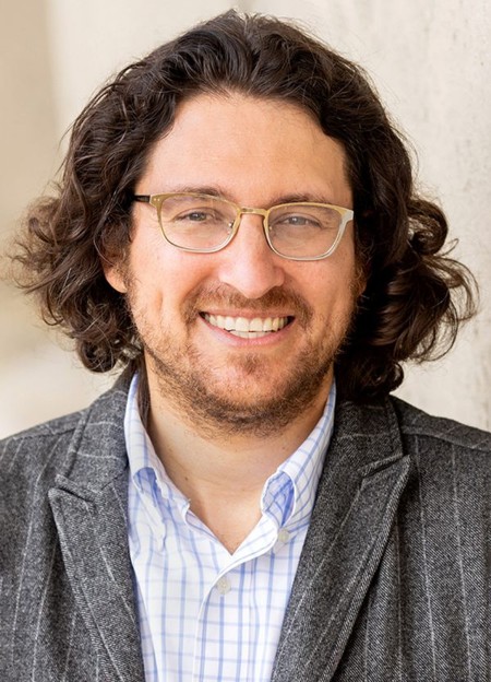 a headshot of director Devin Naar